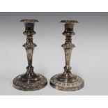 A pair of silver plate on copper knop stemmed candlesticks, (2) 11 x 21cm.
