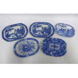 Five Staffordshire blue and white transfer printed mazarine drainers, largest 34cm (5)