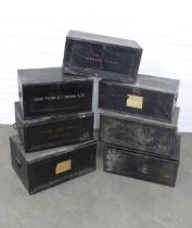 Seven late 19th and early 20th century black deed boxes, some with sign writing (7)