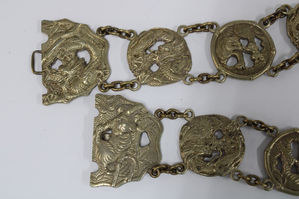 Chinese white metal belt, with thirteen dragon and Buddhistic lion panels with a central two part - Image 5 of 5