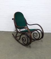 Thonet style rocking chair with green upholstered seat and back, 51 x 84 x 87cm.