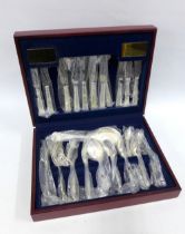 Silver plated cutlery canteen containing a suite of Queens pattern flatware