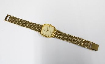 ROTARY, a gold plated wrist watch, signed champagne dial with hour baton markers and a date