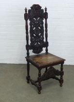 Jacobean style carved oak high back chair, 51 x 129 x 45cm.