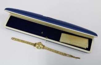 BUCHERER, ladies 18ct gold cased wrist watch, inside of case stamped 750 and signed Bucherer, on