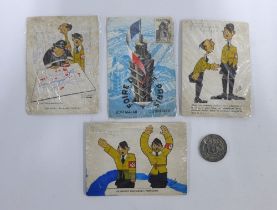 Smits group of three anti-Third Reich World War post cards and a French postcard