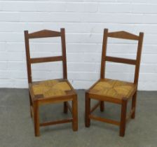 Pair of child's chairs, rush seats, 26 x 66 x 47cm. (2)