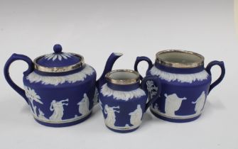 Adams Tunstall blue and white Jasper teapot, cream jug and sugar owl, with silver mounts for