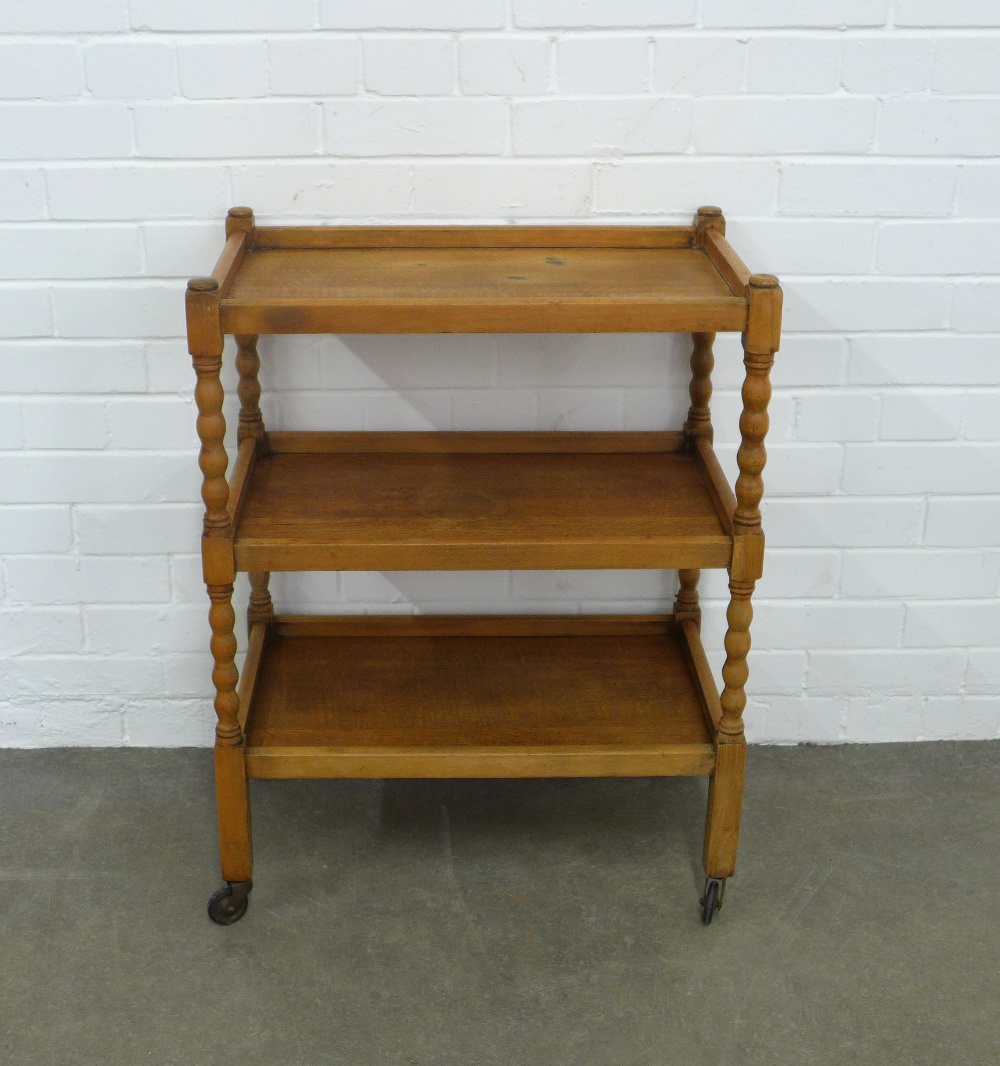 An oak three tier buffet trolley with bobbin supports, , 61 x 80 x 38cm. - Image 2 of 3