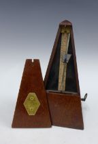 Cased metronome, 12 x 23cm.