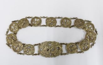 Chinese white metal belt, with thirteen dragon and Buddhistic lion panels with a central two part