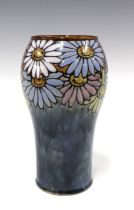 Royal Doulton vase by Florrie Jones, blue ground with a band of flowers , impressed marks and