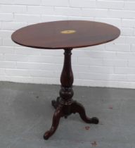 Mahogany pedestal tilt top table with inlaid paterae, 74 x 72 x 51cm.