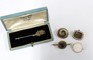 Five various brooches to include a 9ct brooch with turquoise, seed pearl mourning brooch with hair