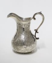 Victorian silver jug, John Tapley, London 1843, foliate engraved pattern and a vacant cartouche,