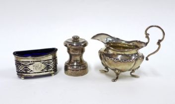 Tiffany & Co Sterling Silver pepper grinder, a Walker & Hall silver cream jug, Sheffield 1927 and