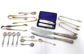 5 silver sugar tongs and various silver salt spoons, two silver handled knives and a pair of