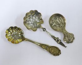 Dutch silver caddy spoon and two silver sifter spoons (3)