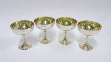 A set of four Mappin & Webb silver gilt goblets, Birmingham 1973, 10cm (4)