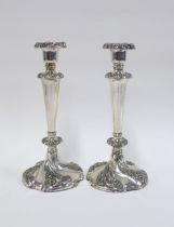 A pair of silver plated knop stem candlesticks, (weighted base) (2) 26cm
