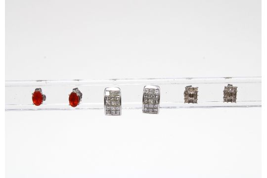 A pair of 14ct gold topaz stud earrings and two pairs of 18ct white gold and daimond earrings (3) - Image 1 of 2