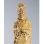 A STRAW GLAZED POTTERY FIGURE OF A TOMB GUARDIAN, SUI TO TANG DYNASTY