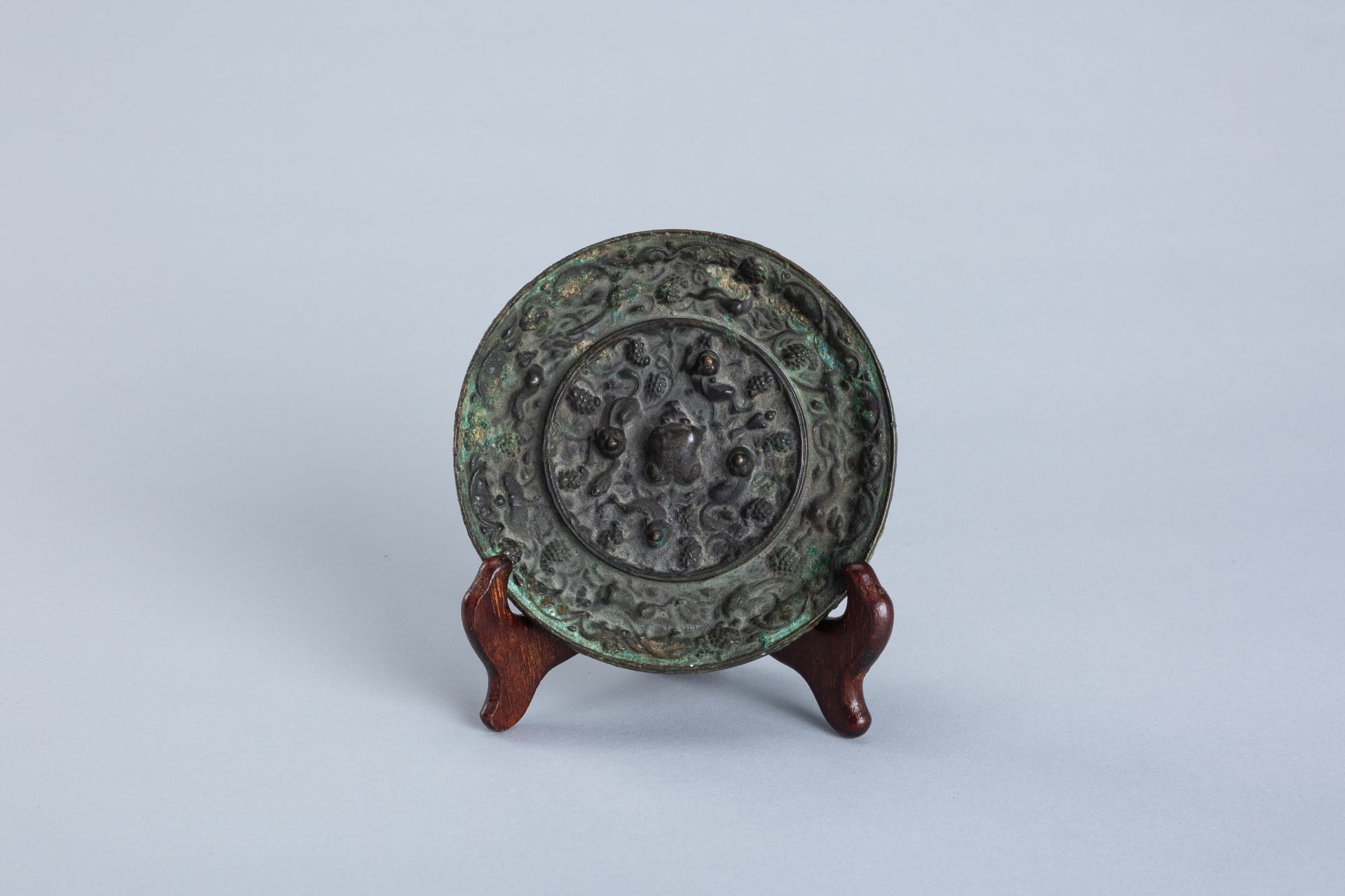 A GROUP OF FIVE BRONZE MIRRORS, HAN DYNASTY AND LATER
