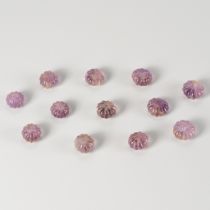 A LOT WITH 12 AMETHYST MELON BEADS, 8-12th CENTURY