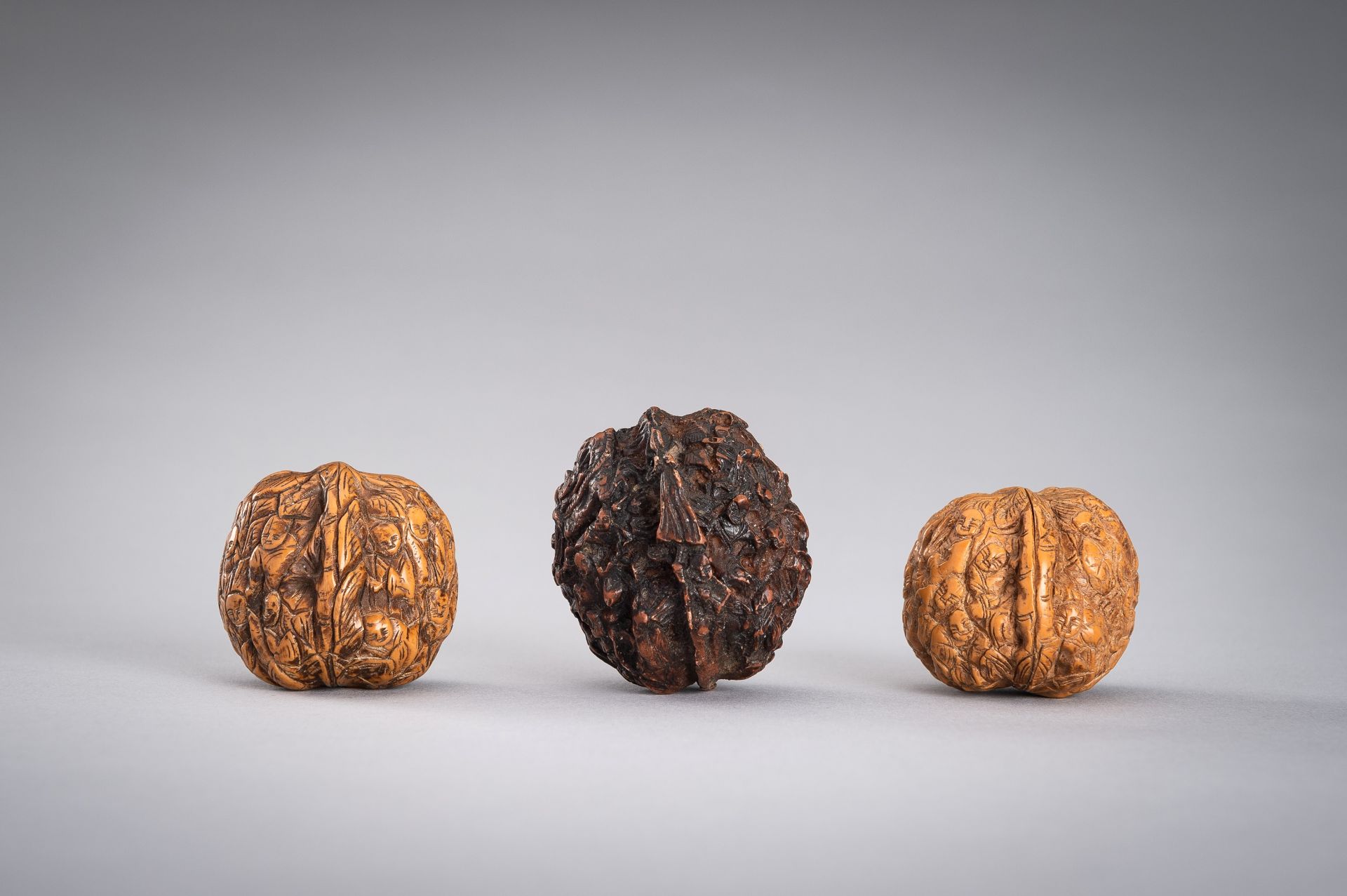 A GROUP OF THREE WALNUT CARVINGS, c. 19020s - Image 8 of 10