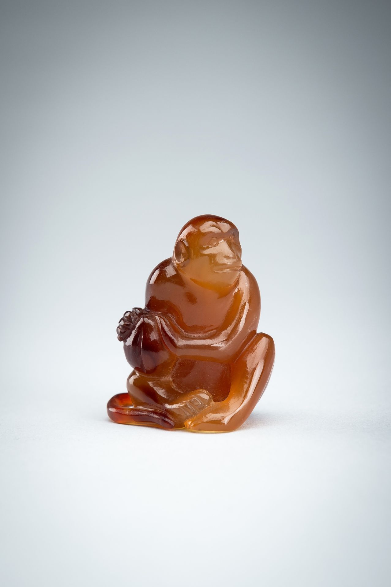 AN AGATE CARVING OF A MONKEY WITH PEACH, c. 1920s - Image 3 of 13