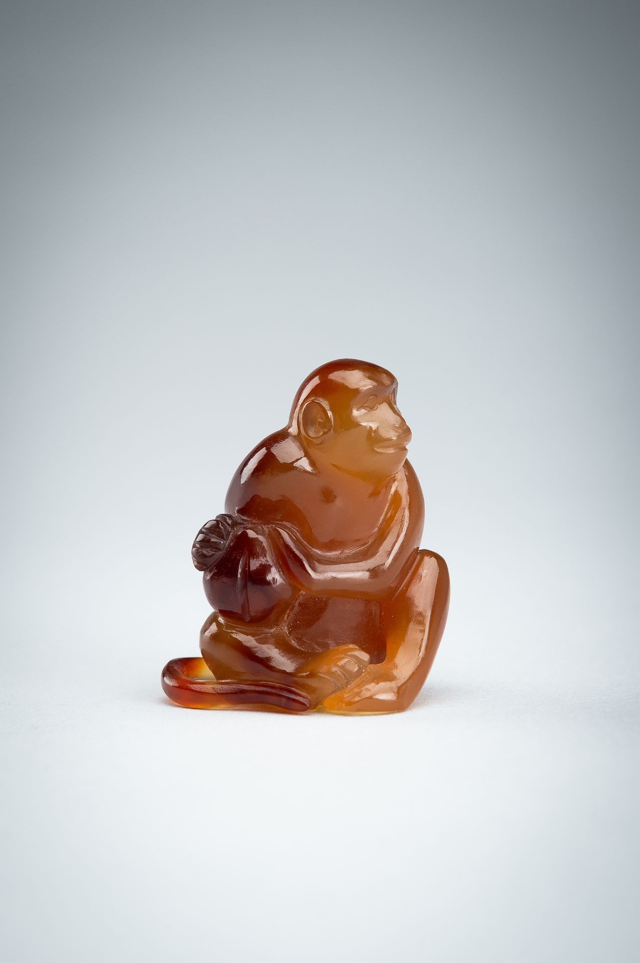 AN AGATE CARVING OF A MONKEY WITH PEACH, c. 1920s - Image 2 of 13