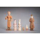 A GROUP OF SIX POTTERY FIGURES, TANG DYNASTY OR LATER