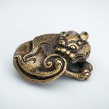A BRONZE 'LION' WEIGHT, MING DYNASTY
