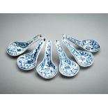 A SET OF SIX BLUE AND WHITE PORCELAIN SPOONS, MING DYNASTY