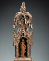 A TEAKWOOD SHRINE WITH A MONK, 19th CENTURY
