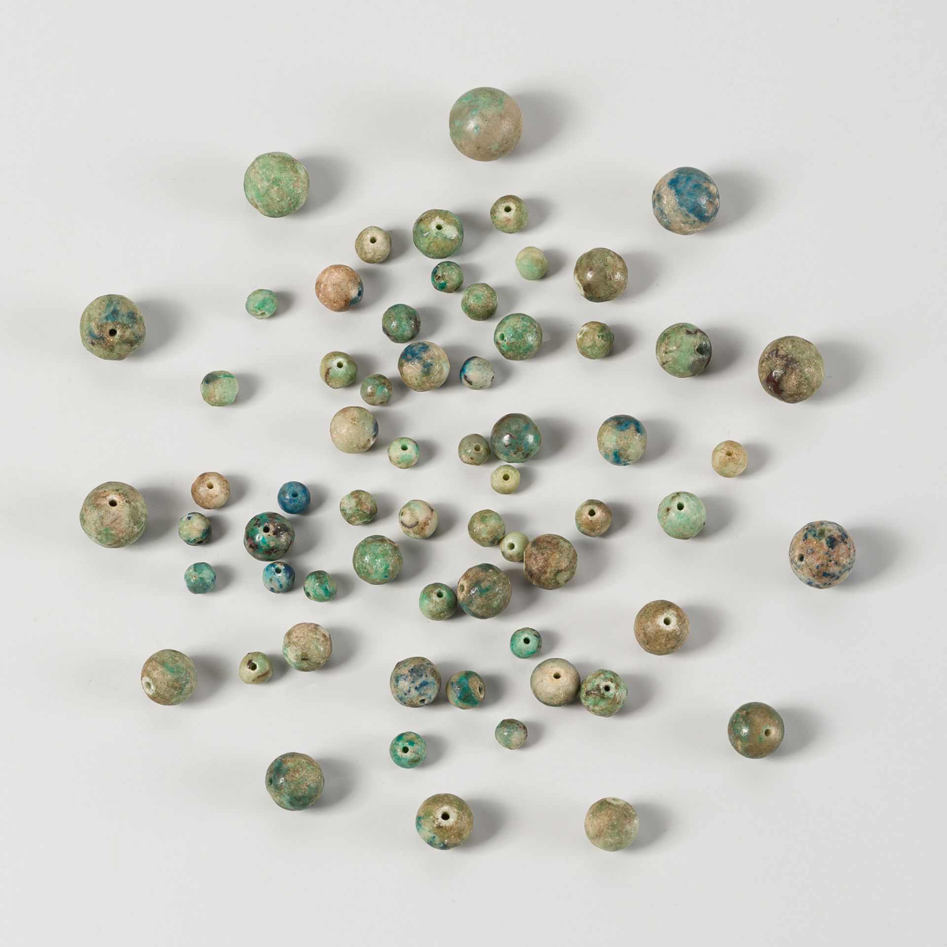 A LOT WITH 64 SMALL TURQUOISE AND LAPIS LAZULI BEADS, 19TH CENTURY OR EARLIER