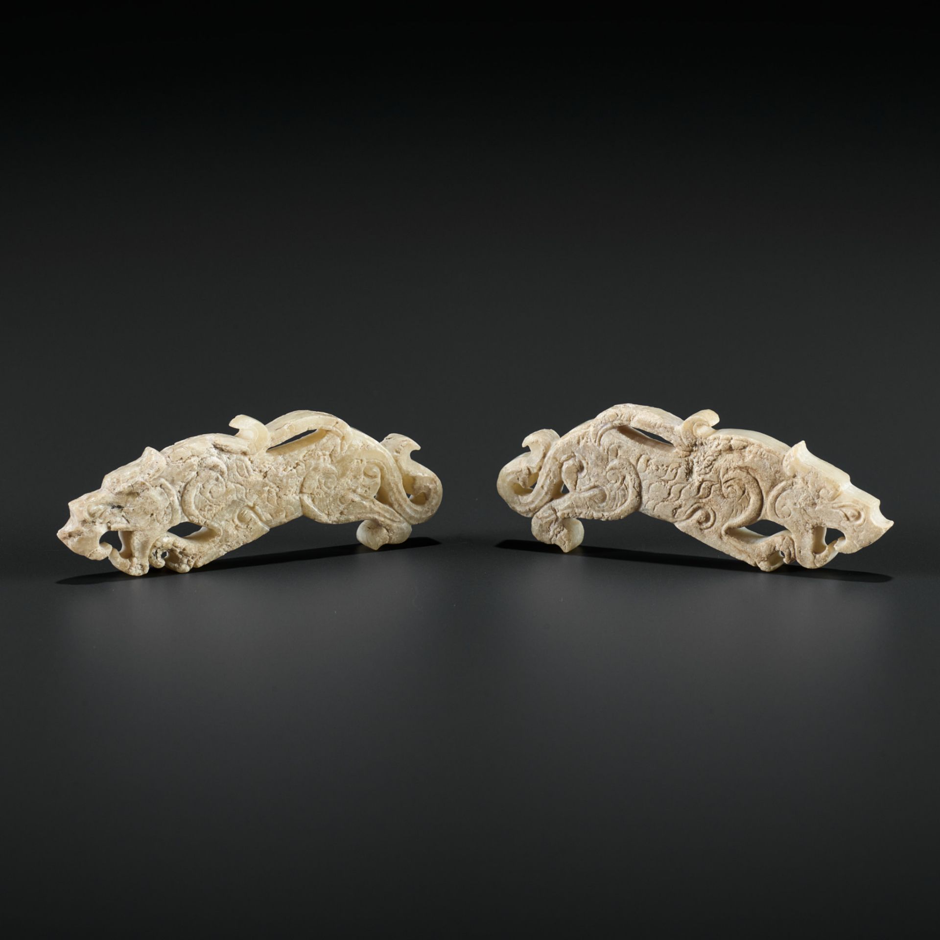 A PAIR OF JADE TIGER PLAQUES, EASTERN ZHOU