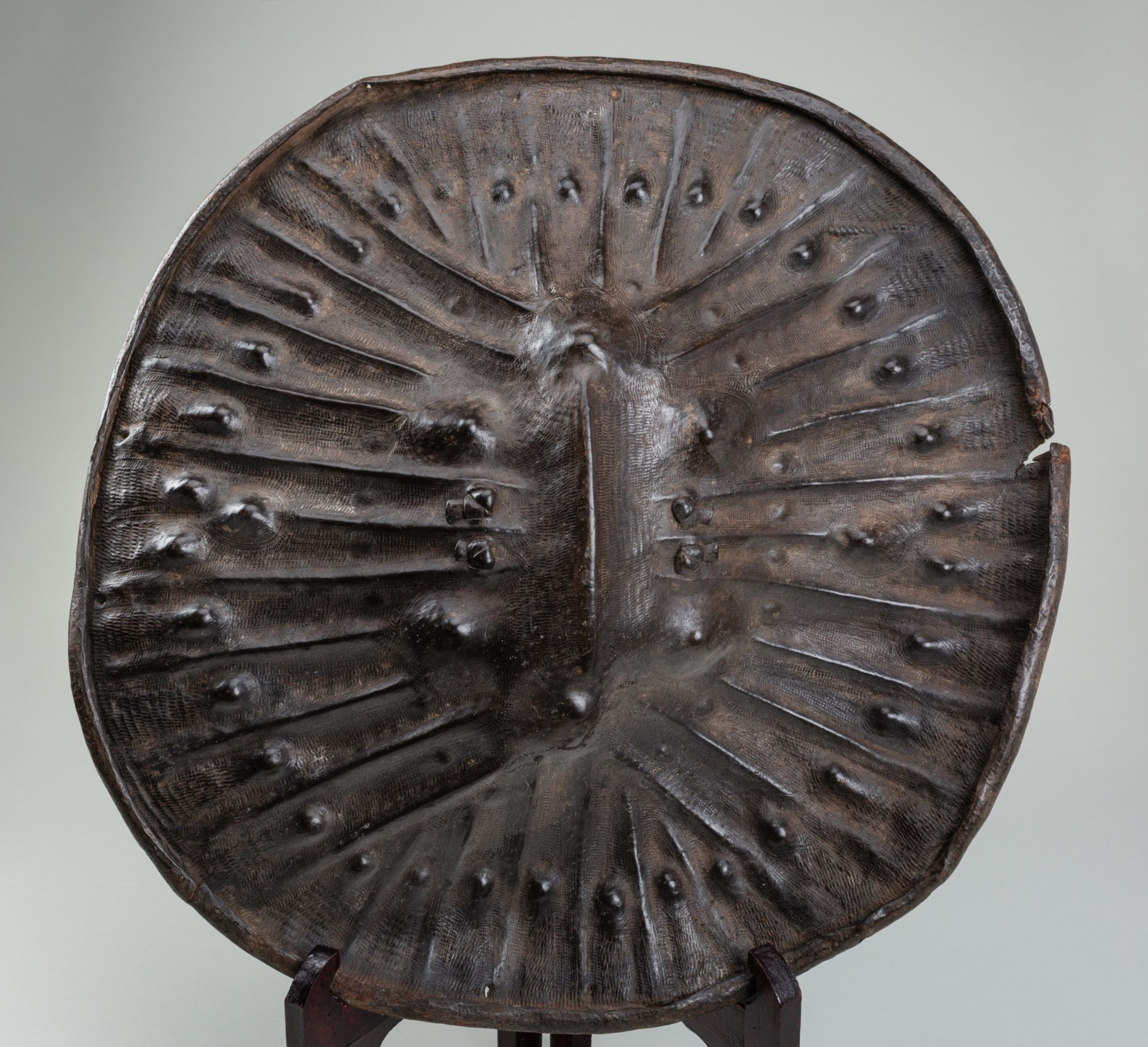 A LARGE OROMO LEATHER SHIELD