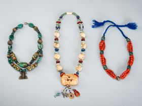 A GROUP OF THREE NECKLACES