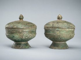 A PAIR OF BRONZE MEDICINE VESSELS AND COVERS, ANGKOR PERIOD, 12TH-13TH CENTURY