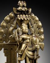 A BRASS FIGURE OF KHANDOBA, INDIA, DECCAN, 18TH CENTURY