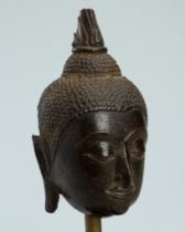 A BRONZE HEAD OF BUDDHA SHAKYAMUNI, AYUTTHAYA KINGDOM, 16TH-17TH CENTURY