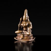 A SMALL BRONZE FIGURE OF SRI DEVI