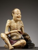 A SOAPSTONE FIGURE OF VIJRAPUTRA, MID-QING DYNASTY