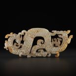 A LARGE AND IMPORTANT WHITE JADE 'DRAGON AND PHOENIX' PENDANT, WARRING STATES