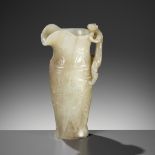 AN IMPERIAL CELADON AND RUSSET JADE 'CHILONG' RHYTON, QIANLONG MARK AND PERIOD