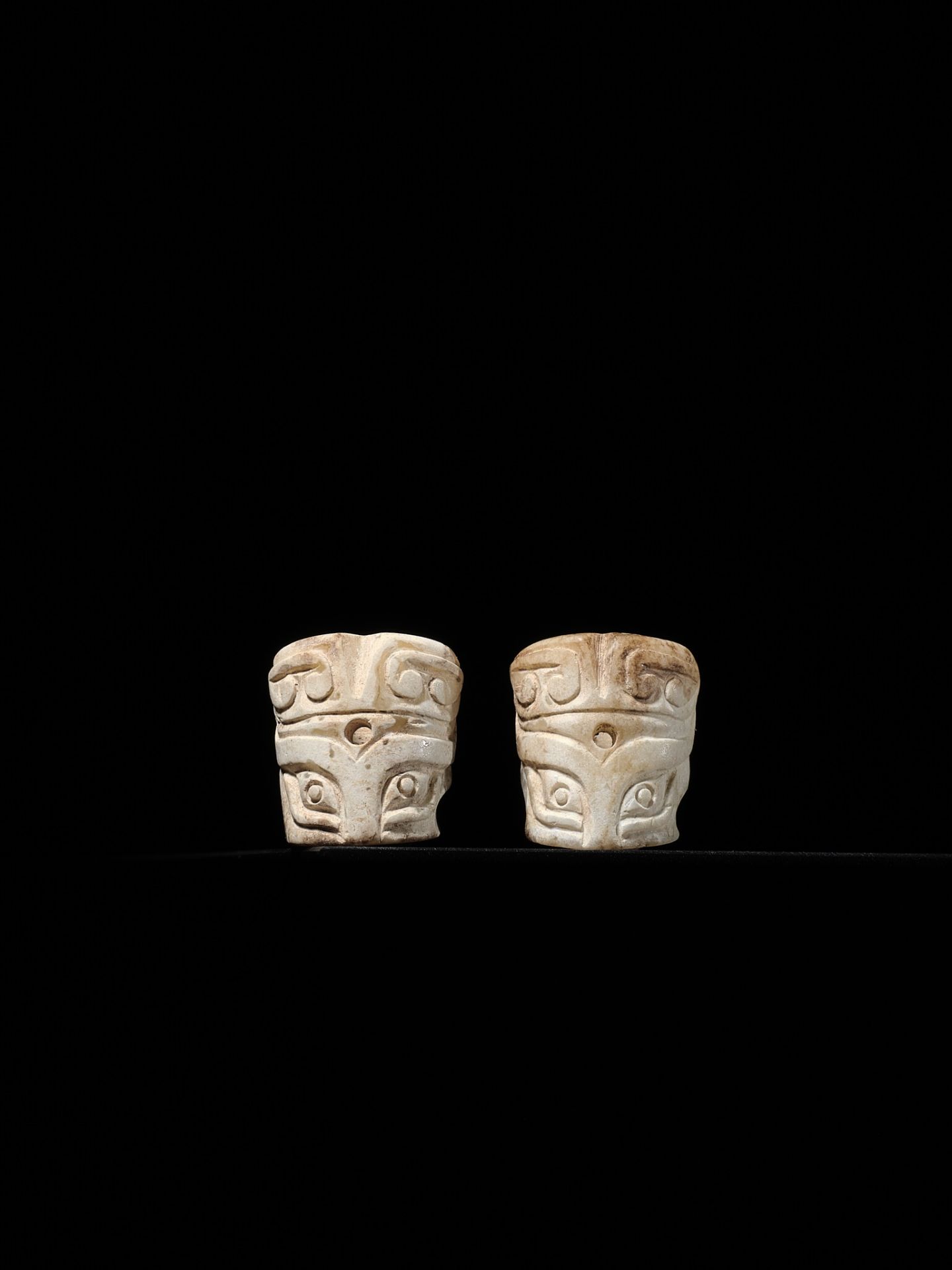 A PAIR OF CYLINDRICAL 'TAOTIE MASK' JADE BEADS, SHANG DYNASTY - Image 9 of 13