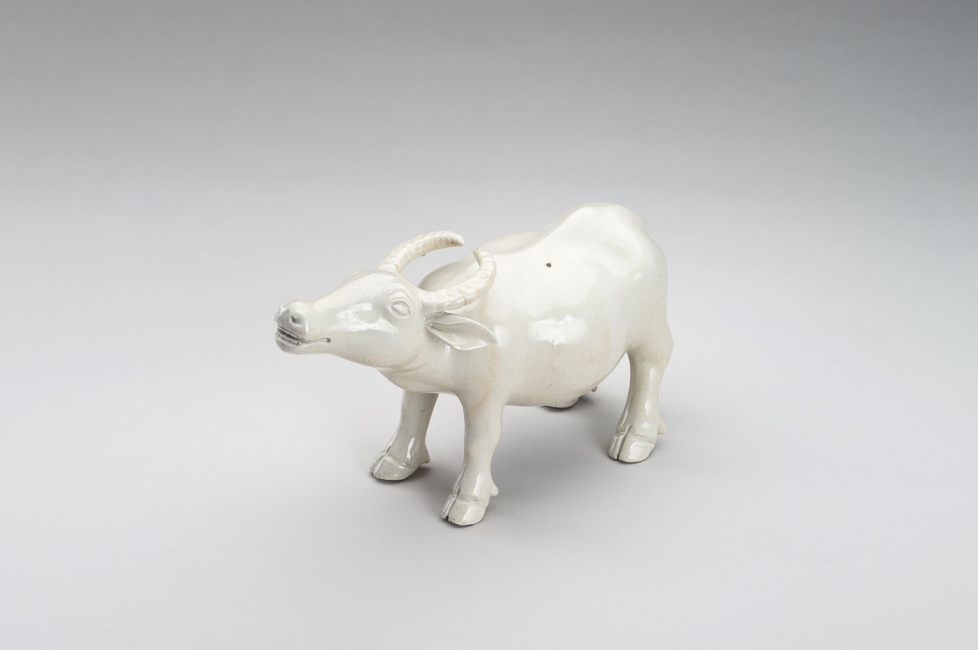 A DEHUA FIGURE OF AN OX, QING DYNASTY - Image 9 of 12