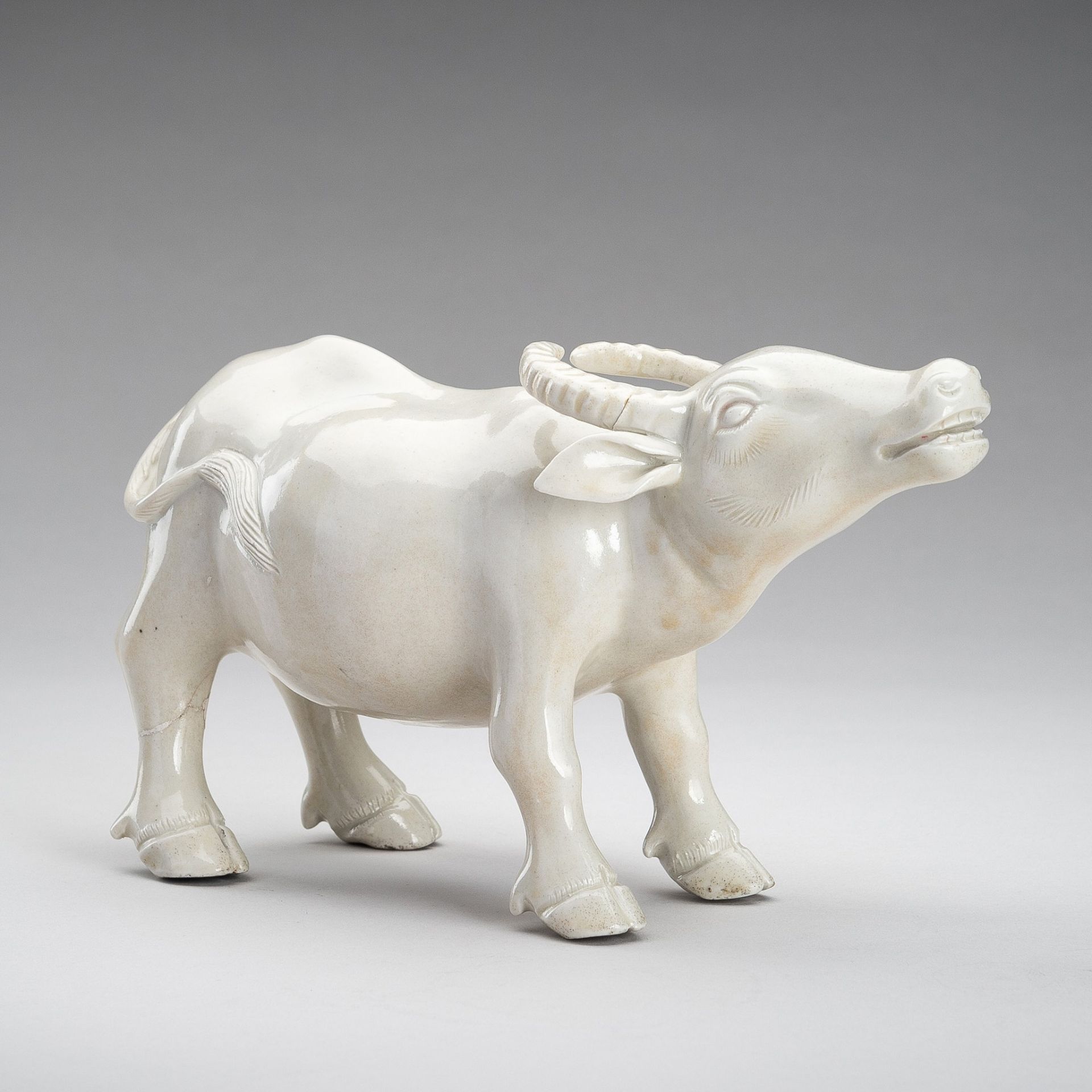 A DEHUA FIGURE OF AN OX, QING DYNASTY