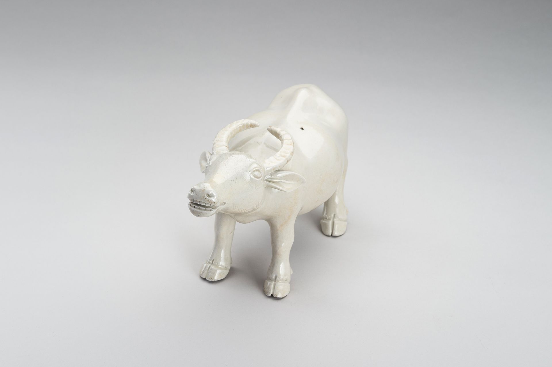 A DEHUA FIGURE OF AN OX, QING DYNASTY - Image 11 of 12